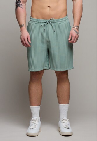 Distorted People - regular Pantalón en verde: frente