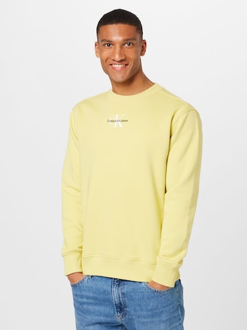 Bluză de molton de la Calvin Klein Jeans pe galben: față