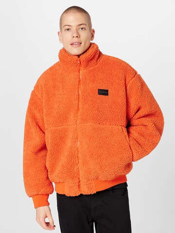 Calvin Klein Jeans Přechodná bunda – oranžová: přední strana