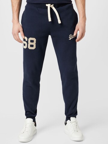 Superdry Tapered Workout Pants 'Vintage Logo Collegiate' in Blue: front