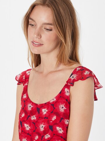 La petite étoile Top in Rot