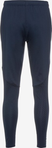 NIKE Slim fit Workout Pants in Blue