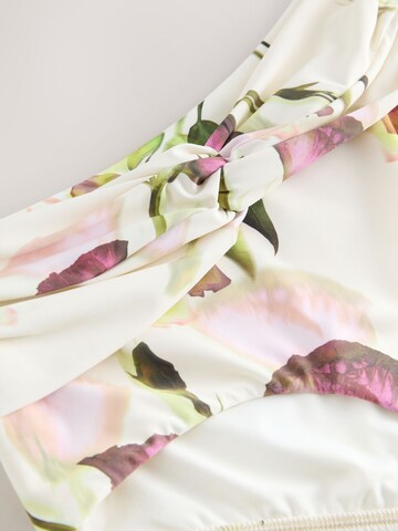 Next Bikinihousut värissä beige