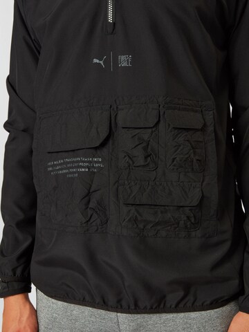 PUMA Sportjacke 'First Mile' in Schwarz