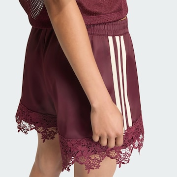 Loosefit Pantalon ADIDAS ORIGINALS en rouge