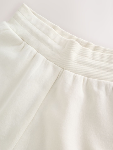 self. Regular Shorts in Beige