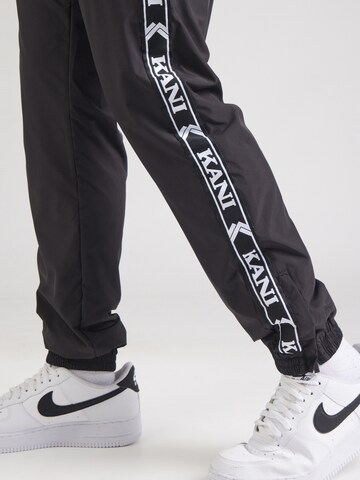 Tapered Pantaloni di Karl Kani in nero