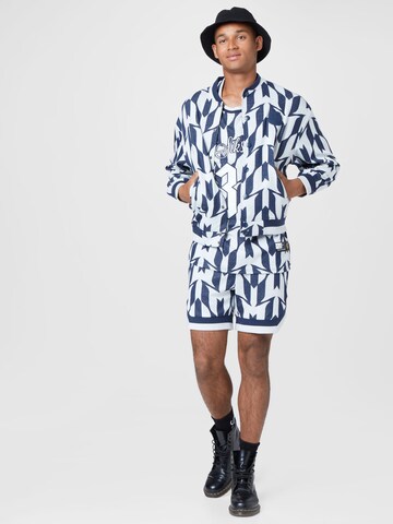 SikSilk Tussenjas 'Messi' in Blauw