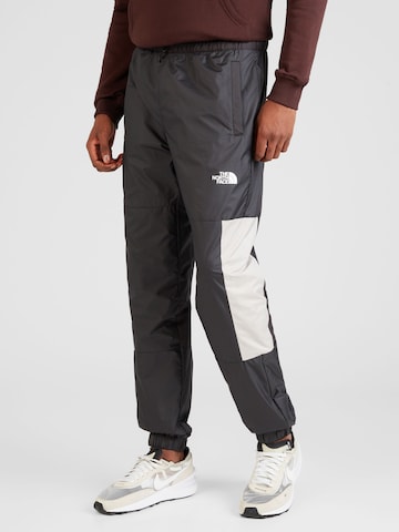 THE NORTH FACETapered Sportske hlače - siva boja: prednji dio