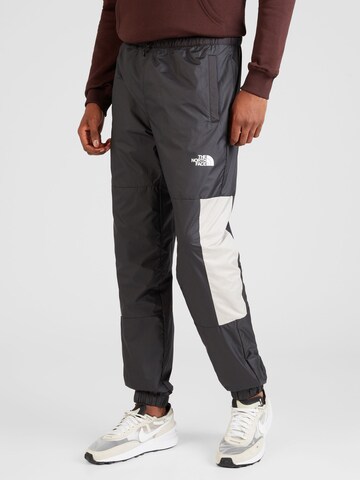 Tapered Pantaloni sportivi di THE NORTH FACE in grigio: frontale