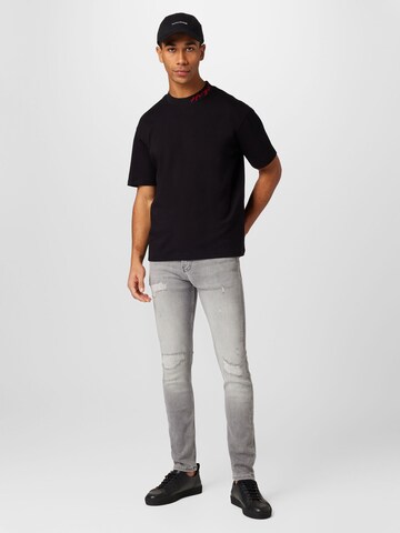 Calvin Klein Jeans - Skinny Calças de ganga em cinzento