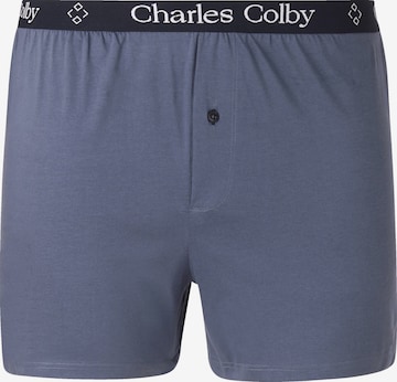 Boxers ' Lord Keyan ' Charles Colby en bleu