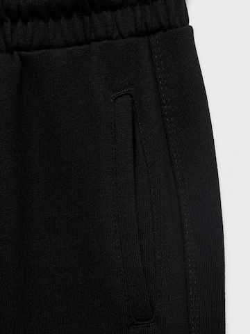 MANGO KIDS Дънки Tapered Leg Панталон 'FRANCIA' в черно