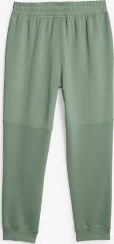 PUMA Zwężany krój Spodnie sportowe w kolorze zielony