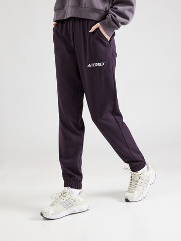ADIDAS TERREX Tapered Workout Pants in Black: front