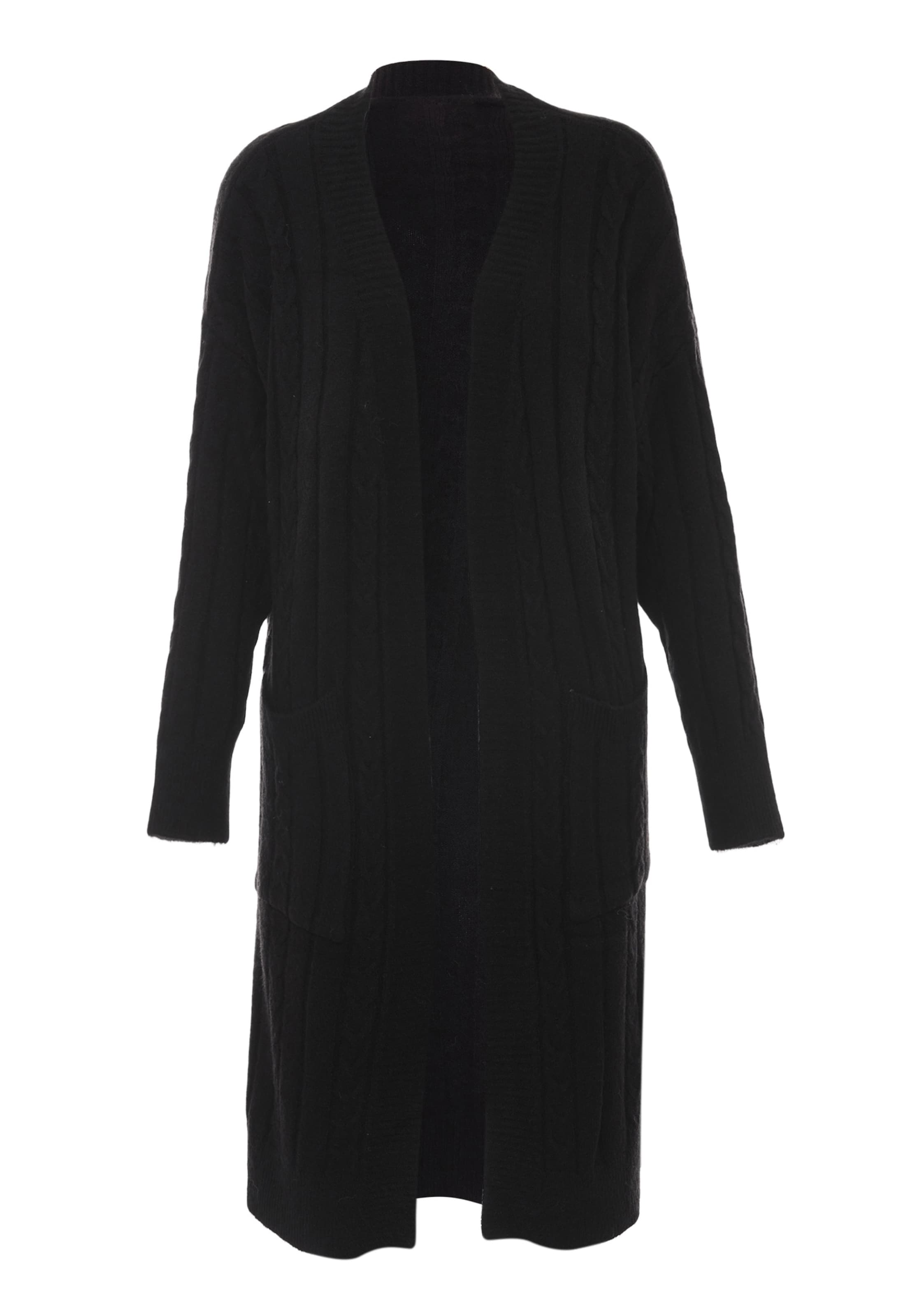 aleva Stickad kappa i svart: framsida