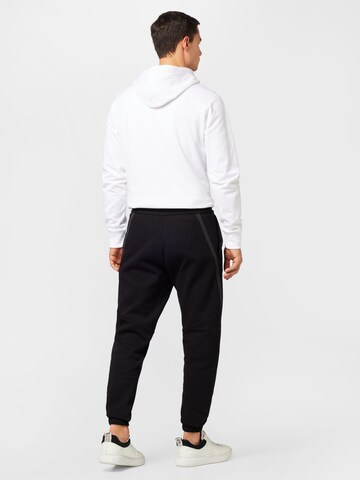 Calvin Klein Tapered Broek in Zwart