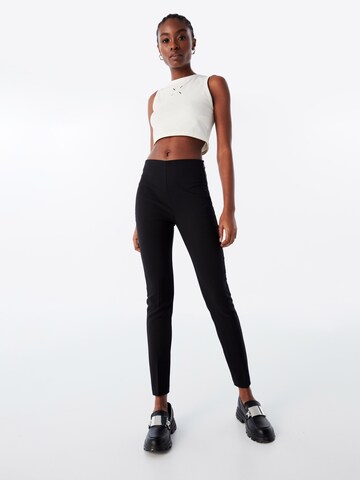 Twist Skinny Leggings in Black