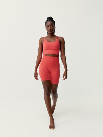 Born Living Yoga Sporttop ' Dana ' in Oranje