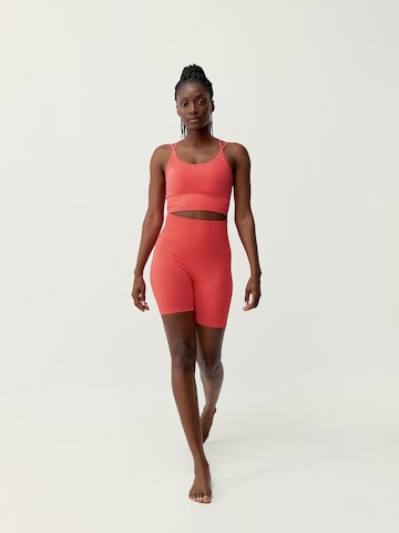 Born Living Yoga Top ' Dana ' in Orange