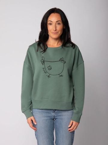 Felpa 'Le poulet ' di Watapparel in verde: frontale