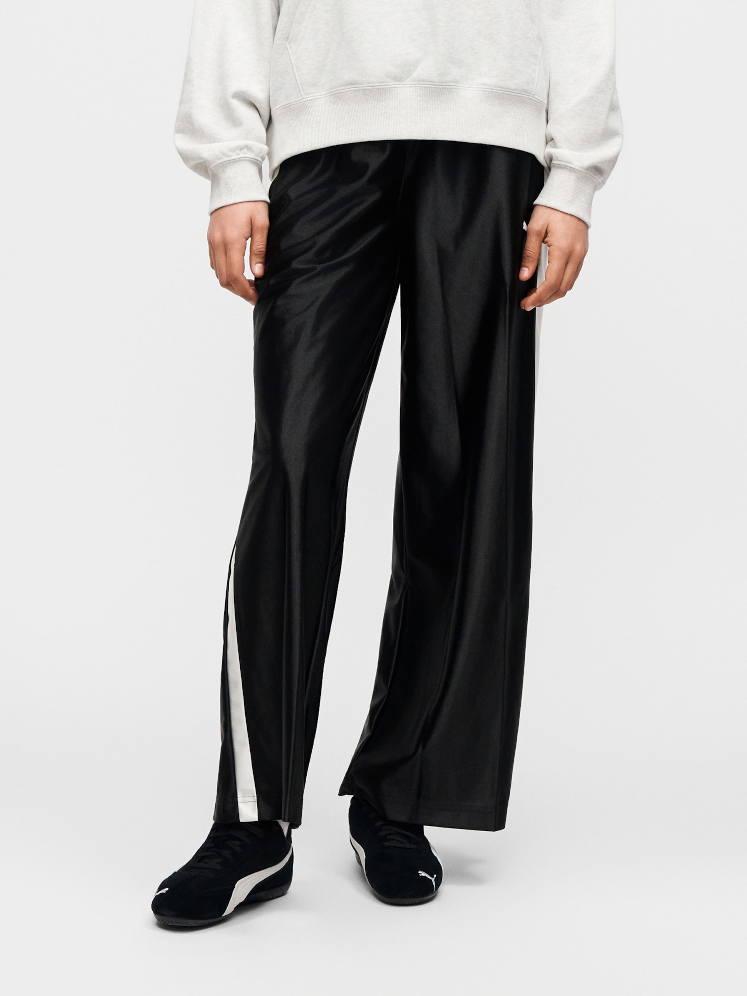 PUMA Wide leg Pants 'Future Archive T7' in Black | ABOUT YOU