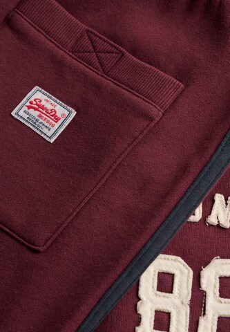 Superdry & Co Loosefit Broek 'Athletic Essentials' in Rood