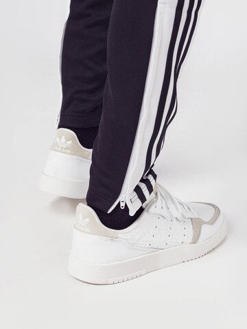 ADIDAS PERFORMANCE Slimfit Urheiluhousut 'Squadra 21' värissä musta