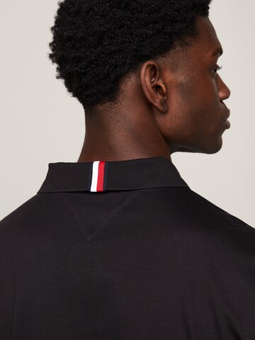 TOMMY HILFIGER Poloshirt 'Essential' in Schwarz