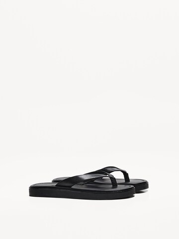 Bershka Klipklappere i sort