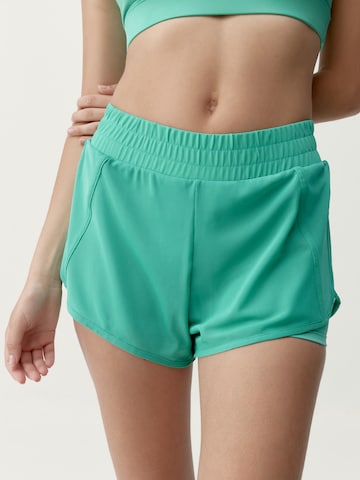 Born Living Yoga Slimfit Sportbroek 'Padma 2.0' in Groen