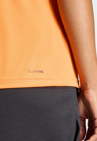 ADIDAS PERFORMANCE - Top deportivo 'Les Mills' en naranja