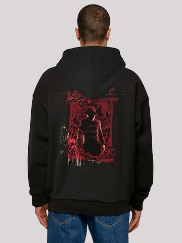 F4NT4STIC Sweatshirt 'Nightmare On Elm Street Freddy Silhouette' in Rood: voorkant