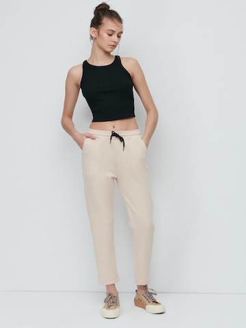 C&City Trousers in Beige: front