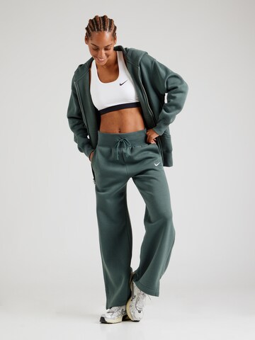 NIKEWide Leg/ Široke nogavice Hlače 'Phoenix Fleece' - zelena boja