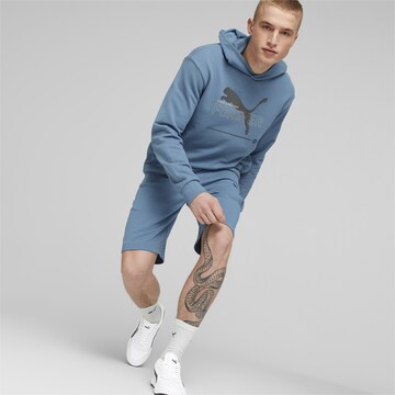 PUMA - Sweatshirt de desporto em azul