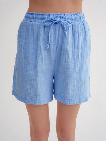 MixRay - Perna larga Calças em azul: frente