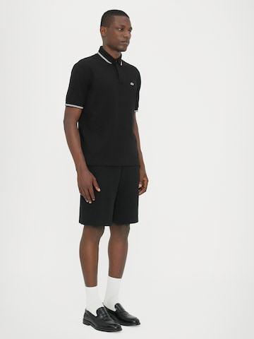 ARMANI EXCHANGE Poloshirt in Schwarz