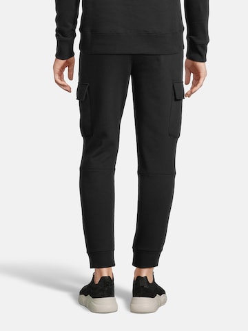 AÉROPOSTALE Tapered Cargo trousers 'HYBRID' in Black