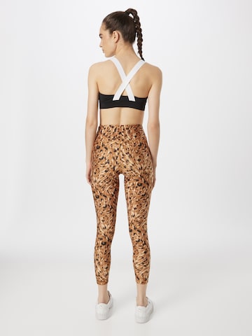 PUMA Skinny Sportbroek 'Safari' in Bruin