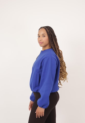 Elara Tussenjas in Blauw