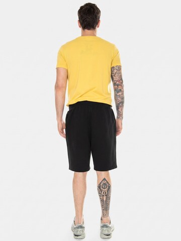 Baggy Pantaloni 'Las Vegas Raiders Primary Logo Graphic Fleece Short black' di Fanatics in nero