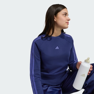 ADIDAS SPORTSWEAR - Sudadera en azul