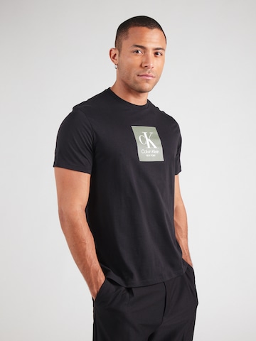 Tricou de la Calvin Klein pe negru: față