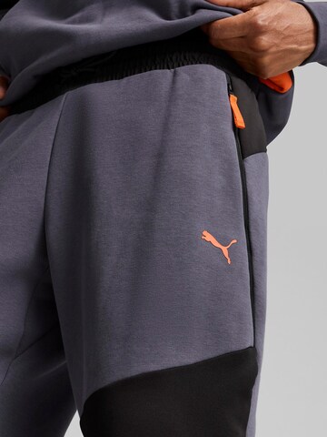 Effilé Pantalon de sport PUMA en gris