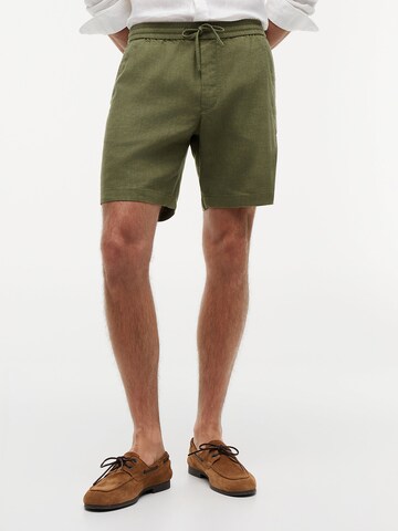 Pantalon chino TOMMY HILFIGER en vert : devant
