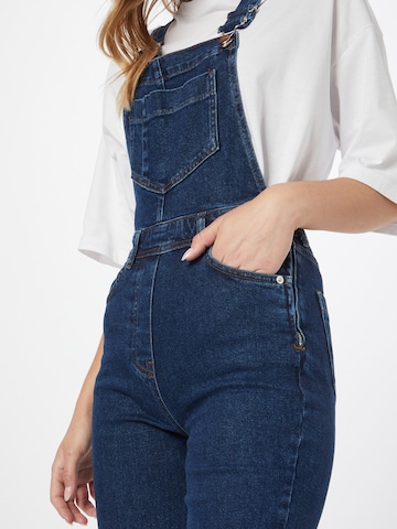 Warehouse Flared Latzjeans in Blau