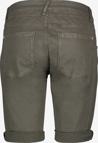 Slimfit Jeans di Cartoon in verde