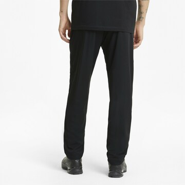 PUMA Tapered Sportbroek in Zwart