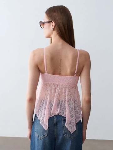 Top di Dilvin in rosa